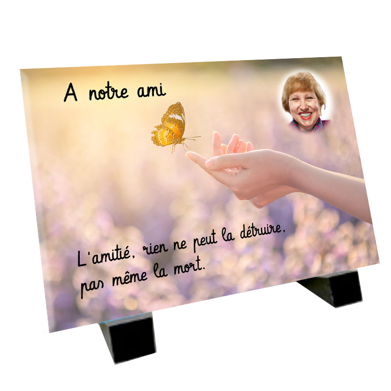 Plaque funéraire avec petit papillon